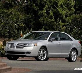 2010 Lincoln MKZ: The distinctive Lincoln style is readily apparent in the 2010 Lincoln MKZ. A split-wing grille flanks the distinctive Lincoln star and foreshadows heightened levels of luxury, comfort and styling found on the 2010 model. (04/17/09)