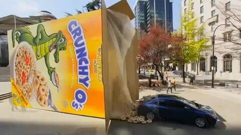2012 honda civic pops out of a multi story cereal box