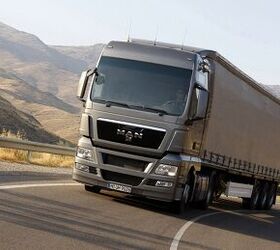 volkswagen makes bid for man heavy trucks