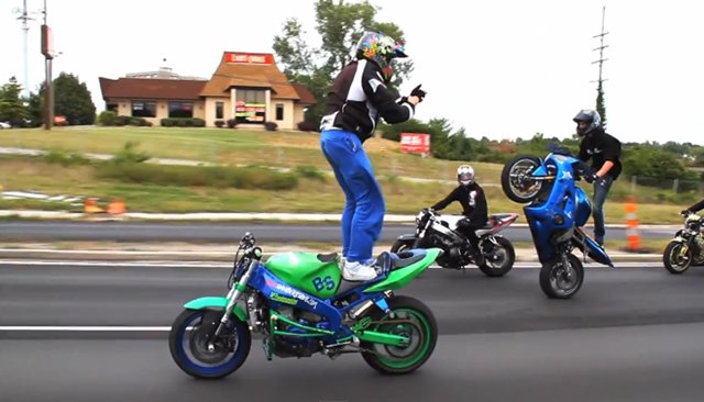 watch motorcycle stunt riders take over st louis in this amazing idiotic video