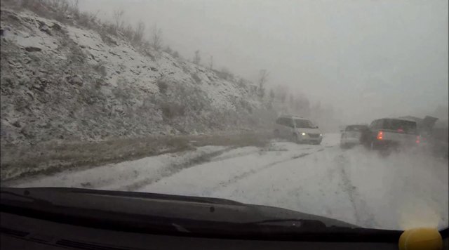 Mitsubishi Evo Narrowly Avoids Pile Up on West Virginia Turnpike [Video]