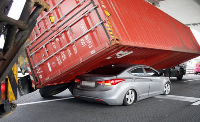 Hyundai Elantra Crushed by Shipping Container