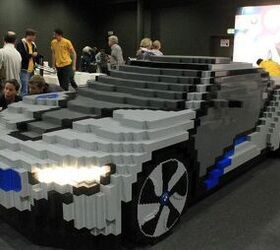 https://cdn-fastly.autoguide.com/media/2023/06/08/12441511/bmw-i8-concept-becomes-life-sized-lego-toy.jpg?size=720x845&nocrop=1