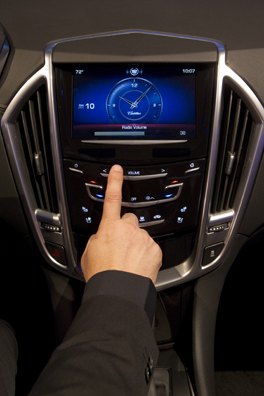 Cadillac unveils CUE – a full suite of infotainment, navigation and communication tools that combines natural voice recognition, fewer buttons, larger icons and greater customization to provide a more intuitive connected driving experience Tuesday, October 11, 2011 in San Diego, California. CUE, which stands for Cadillac User Experience, has 3.5 times more processing power than…