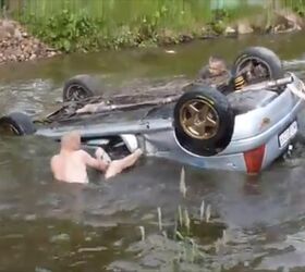 watch spectators rescue rally racers trapped in submerged car video
