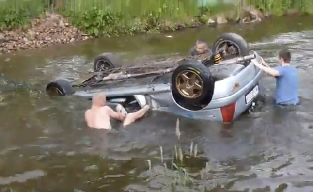 Watch Spectators Rescue Rally Racers Trapped in Submerged Car – Video