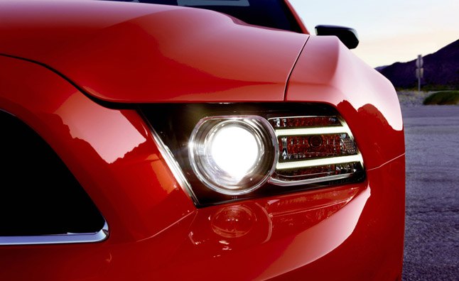 2013 Ford Mustang: New design elements include standard high-intensity discharge (HID) headlamps on both V6 and GT cars. Signature lighting plays into the technology upgrades, with two individual light-emitting diode bars accentuating the headlamps. (03/12/12)