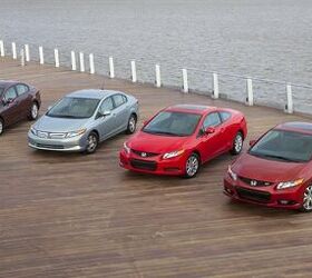 2012 Honda Civic lineup. Pictured left to right are Civic EX-L Sedan, Civic Hybrid, Civic EX Coupe, Civic Si Coupe.