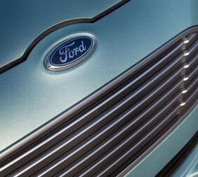canadian auto workers ford agree to four year deal