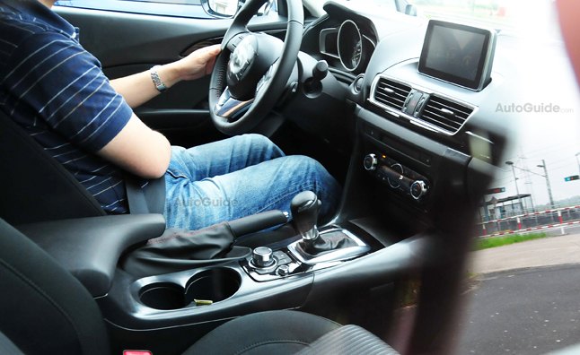 2014 Mazda3 Interior Revealed in Spy Photos | AutoGuide.com 2014 Mazda3 Interior Revealed in Spy Photos | AutoGuide.com