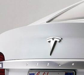 Tesla Loan Repayment Opens Door to Acquisition Rumors