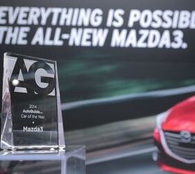 autoguide com hands out the hardware at the 2014 detroit auto show