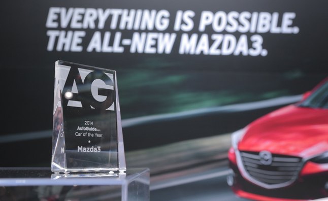 AutoGuide.com Hands Out the Hardware at the 2014 Detroit Auto Show