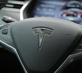 Tesla Motors Reports $74 Million Net Loss in 2013