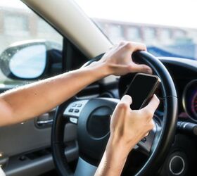 Female driver texting