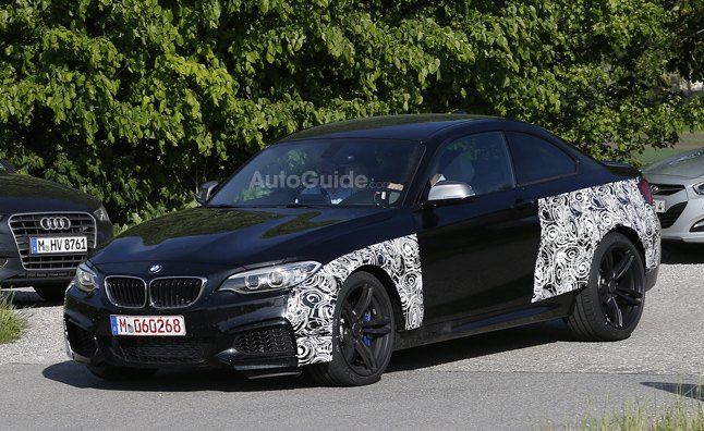 bmw m2 caught in spy photos for first time