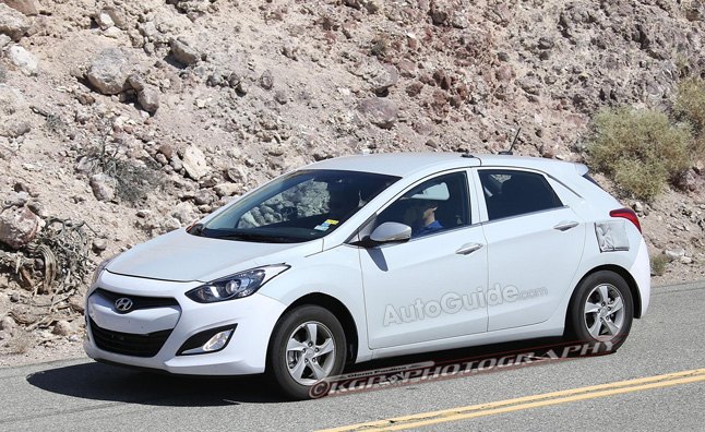hyundai s new toyota prius fighter spotted testing