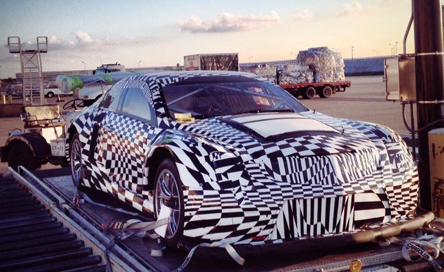 new cadillac gt3 race car spied in chicago