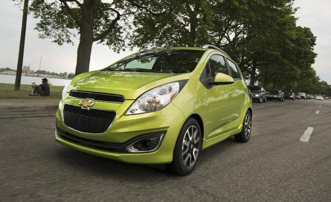 The 2013 Chevrolet Spark drives through Belle Isle in Detroit, Michigan during a media event Thursday, August 2, 2012. (Photo by John F. Martin for Chevrolet)