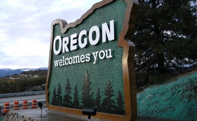 oregon to implement per mile road tax