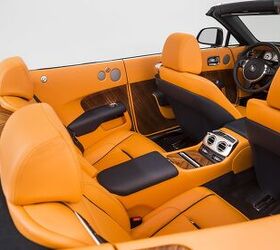 2016 rolls royce dawn combines opulence with a canvas roof
