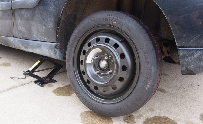 How to Change a Flat Tire | AutoGuide.com