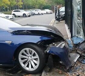 Tesla Flies Through the Air, Drives Over Mercedes, Crashes Into Dealership