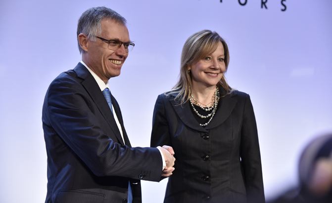 gm officially sells opel to france s psa group in 2 2 billion deal