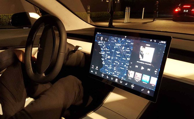 The Tesla Model 3 Will Keep Its Boring Dash