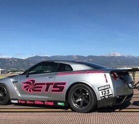 watch a nissan gt r hit 255 mph in a half mile