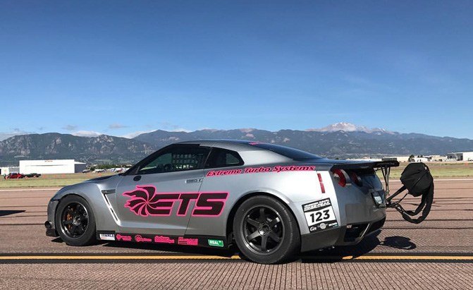 watch a nissan gt r hit 255 mph in a half mile