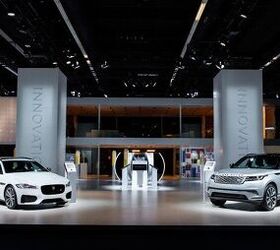 jaguar land rover looking to buy a luxury automaker report