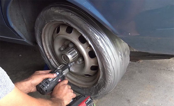 watch duct tape spare tire not as bad an idea as it sounds