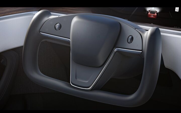 2021 tesla model s gets more power revamped interior and bizarre steering wheel