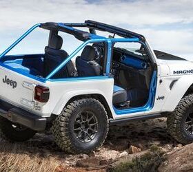 The exterior of the Jeep(R) Magneto BEV concept features a Bright White color with Surf Blue accents, along with a heavy-duty performance hood with center scoop and custom decal, redesigned rear gate and dramatic full-width forward lighting. Custom Royal Blue and Black leather seats with Sapphire-colored inserts and straps, Surf Blue truck bed liner and Mopar slush mats give the Magneto's interior design an electrified appearance.