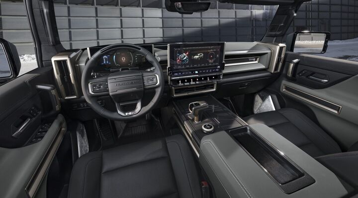 The GMC HUMMER EV SUV debuts in the low-contrast Lunar Shadow interior and includes a spacious cargo area and an architecturally inspired cabin.