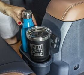 This cupholder is one of the five FITS (Ford Integrated Tether System) slot accessories available for purchase. This available accessory package includes cupholders, a storage or trash bin, cord organizer, double hook for grocery bags and purses and under-seat storage dividers. *
*Disclaimer:  Preproduction vehicle and preproduction Ford Accessory shown.