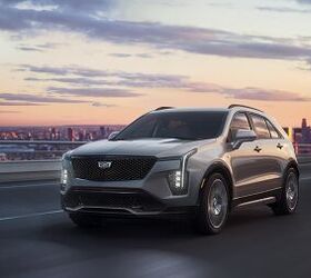 The 2024 Cadillac XT4 in Argent Silver Sport hits the road, showing off curated design updates for a bold, modern look. Argent Silver Sport and all-new 20-inch alloy wheels shown here.