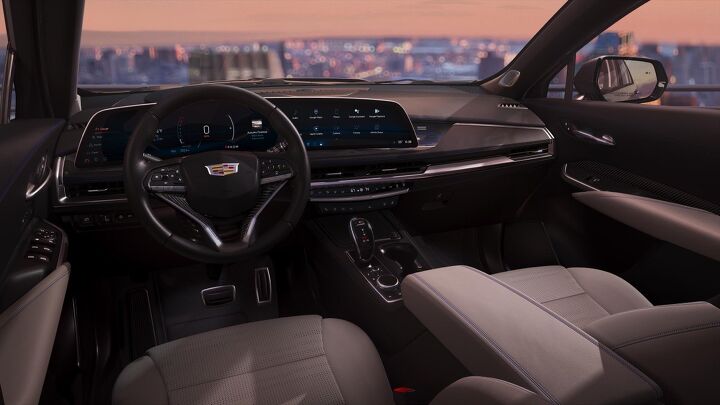 View of the fresh new interior design in the 2024 Cadillac XT4, featuring a LYRIQ-inspired 33-inch-diagonal interface and display with 9K resolution.