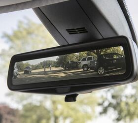The available rear camera mirror provides a video view, displaying a wider, less obstructed field of view compared to a traditional rearview mirror