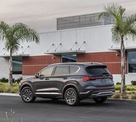 ford edge vs hyundai santa fe which mid size crossover is the best deal for your