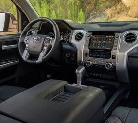 nissan titan vs toyota tundra which japanese half ton truck should you choose