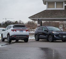 hyundai tucson hybrid vs ford escape phev comparison