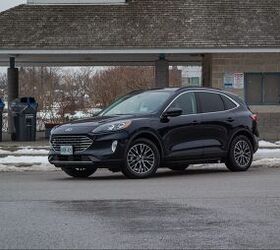 hyundai tucson hybrid vs ford escape phev comparison