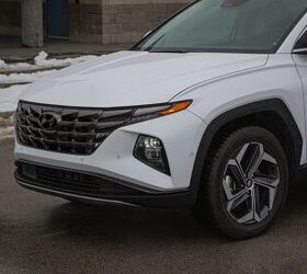 hyundai tucson hybrid vs ford escape phev comparison