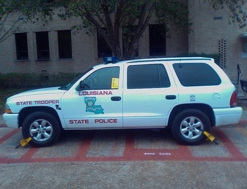 louisiana state trooper s ride gets booted for parking illegally