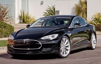 Elon Musk Bets Auto Journalist $1 Million the Tesla Model S Will Arrive Next Year