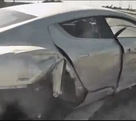 watch an aston martin rapide wrecked from the passenger seat video