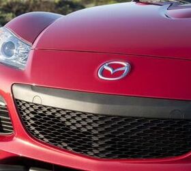 mazda will continue to develop rotary engines