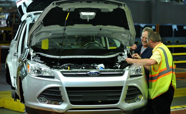 LOUISVILLE, Ky., June 13, 2012 — Workers at Ford's Louisville Assembly Plant assemble the all-new Escape after an employee celebration to mark the million transformation of the facility. Ford added 1,800 jobs for a second shift at the plant earlier this year, and will be adding another 1,300 to a third shift starting in the…
